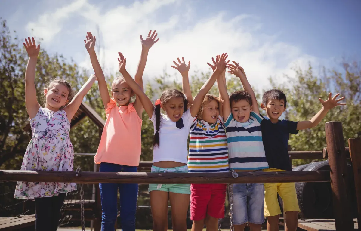 Creating a Positive Future- kids on a playground having fun.